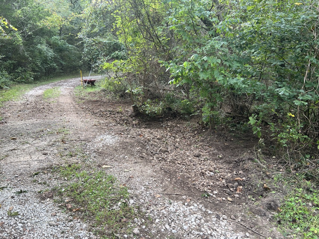 The same area as previous photos showing where a new ditch has been dug and covered with a layer of gravel